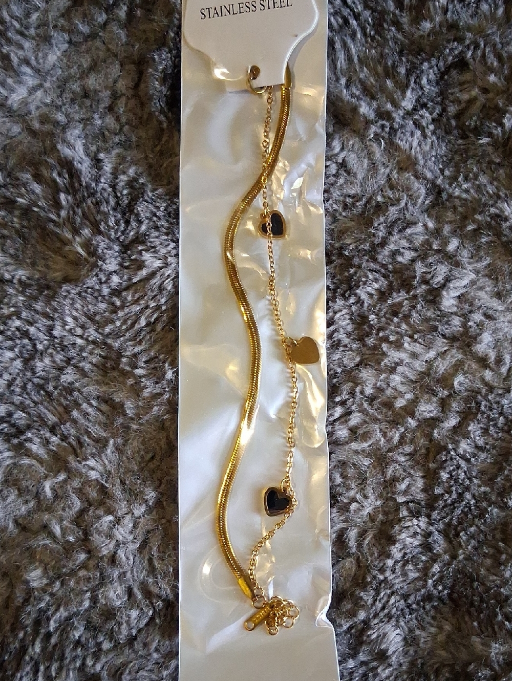 Gold Heart Charm Bracelet with Black Accents